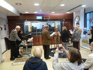 Members participating in a radio drama